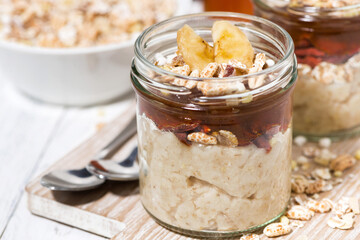 oat pudding with jam and bananas, closeup