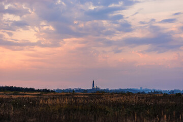 Obraz premium landscape with the Orthodox Church on the horizon in the autumn evening