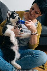 woman with her dog at home
