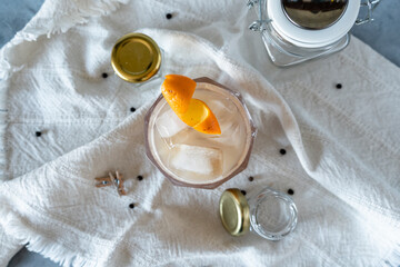 Top view of orange peel decorated author's cocktail