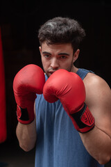 Fototapeta na wymiar male boxing fight red gloves