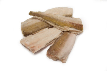 Large slices of raw fish hake on a white background.Menu concept, fish day. Isolate. Copyspace