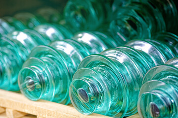 Glass insulators for high-voltage electric poles are on the shelf. Storage of materials for...