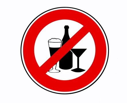 Alcohol consumption in not permitted in this area, prohibition sign with silhouettes of wine bottle, small beer glass and cocktail glass.