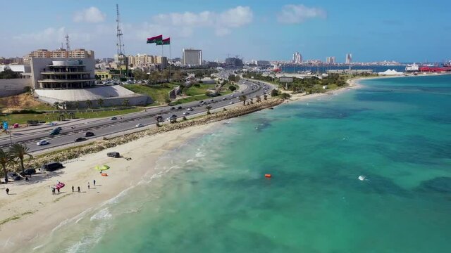 Surfing at seafront of capital of Libya, Tripoli 