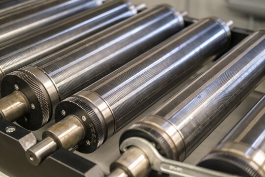  Rows of Large offset printing press. moving polymer label conveyor typography facility and flexographic printing