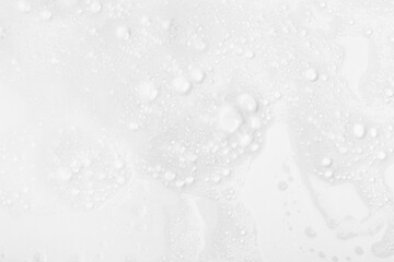 Fototapeta premium Abstract background white soapy foam texture. Shampoo foam with bubbles