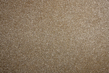 Fototapeta premium Christmas background. Gold glittering background for your design. Flat lay, place for text.
