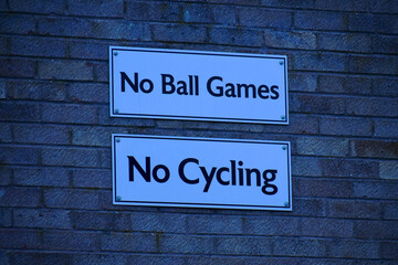 No signs on a red brick wall, England