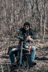 Biker portrait. Photo with a motorcycle