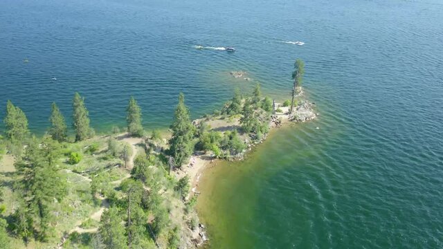 Passing over Tubbs Hill with drone in summer on Coeur d'Alene Lake