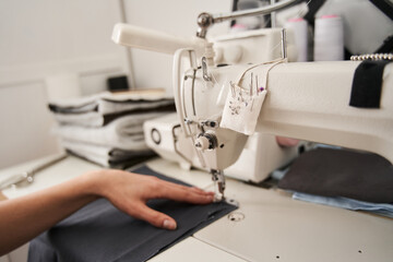 Seamstress work on the sewing machine