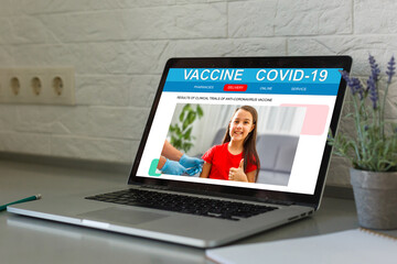 Fototapeta na wymiar on the laptop monitor information about vaccination against Covid-19