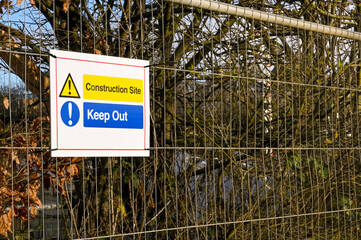 Fototapeta premium Keep Out sign on a metal fence around a construction site