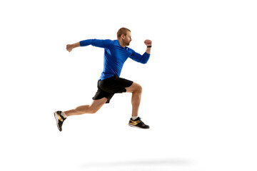Fototapeta na wymiar Win. Caucasian professional jogger, runner training isolated on white studio background. Muscular, sportive man, emotional. Concept of action, motion, youth, healthy lifestyle. Copyspace for ad.