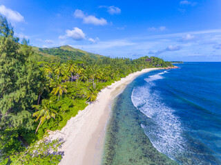 An aerial view on Grand Anse beach on Praslin island in Seychelles