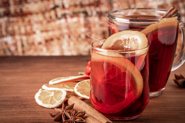 German tradition winter Christmas market new year holidays festival drink tea Gluhwein Mulled sweet hot warm red Wine with spices citrus aromatic cinnamon star anise
