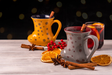 German tradition winter Christmas market new year holidays festival drink tea Gluhwein Mulled sweet hot warm red Wine with spices citrus aromatic cinnamon star anise