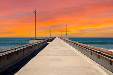 Fototapeta premium View of Venice Pier with sunset sky in Los Angeles, California.