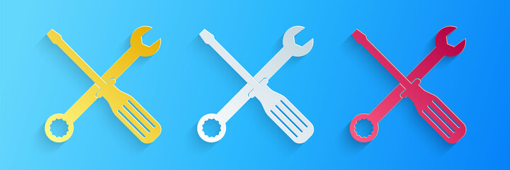 Paper cut Spanner and screwdriver tools icon isolated on blue background. Service tool symbol. Paper art style. Vector.