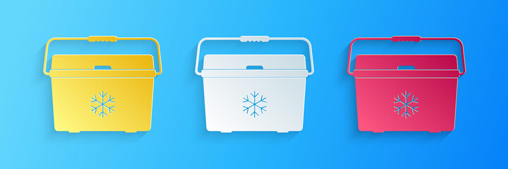 Paper cut Cooler bag icon isolated on blue background. Portable freezer bag. Handheld refrigerator. Paper art style. Vector.