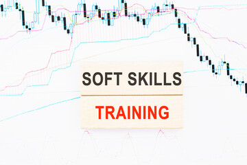 Word soft skills trading. Wooden small cubes with letters with copy space available. Business Concept image.
