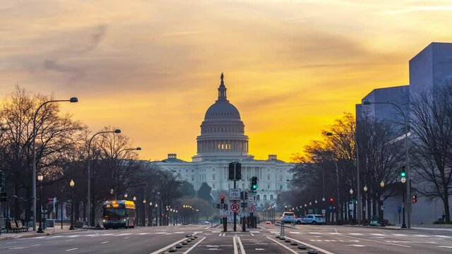 Timelapse of Pennsylvania Avenue and US Capitol at sunrise, Washington DC, USA