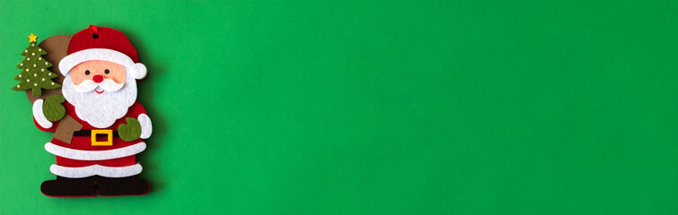 Christmas or New Year's open with Santa Claus on a green background.