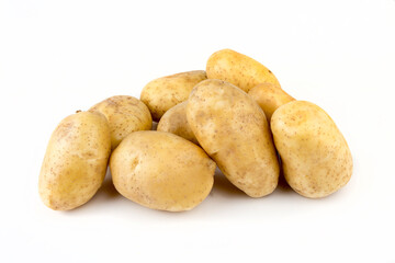 Fresh organic vegetables; potatoes on the white background.