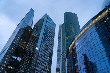 Obraz premium Moscow, Russia, November 30 2020, Moscow international business center (Moscow city), night photography with long exposure, selective focusing, glare of night lights high-rise buildings made of glass