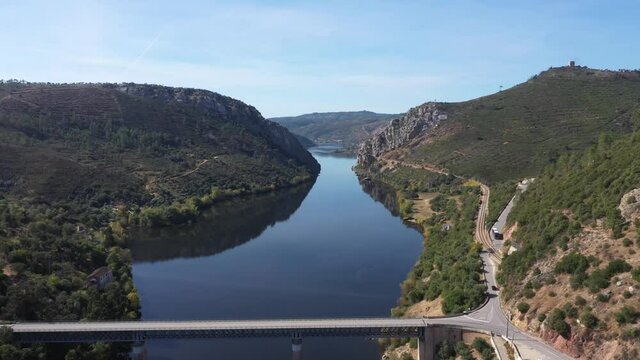 Scenic View Of Natural Monument Portas de Rodao Near Bridge Over Tagus River In Vila Velha de Rodao, Portugal - drone pullback