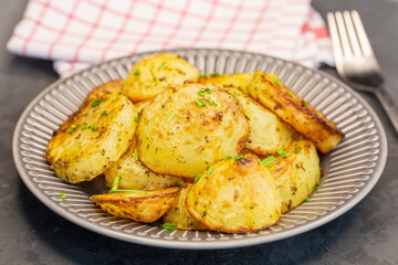 Delicious baked potato with green garlic