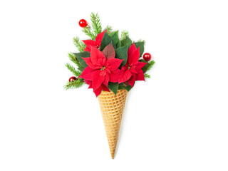 Waffle cone with poinsettia flowers, fir branches and Christmas tree decorations. White isolated background. Christmas card. flat lay. The concept photo is an original Christmas present.