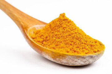 Turmeric powder isolated on white background.