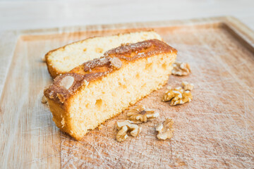 Delicious typical mediterranean spanish cake, a coca. Beautiful pastry slices with nuts and almonds.