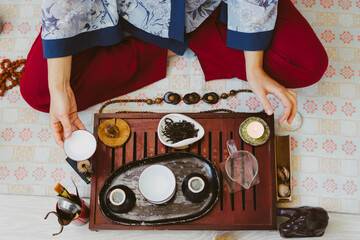 Tea ceremony. Beautiful tea set. Drink tea according to Chinese traditions and customs.