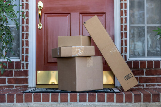 Online orders accumulate on the doorstep of a residence tempting theives