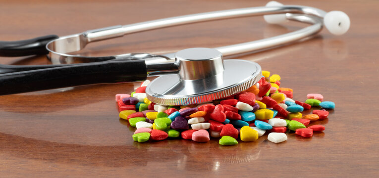 picture of pills and stethoscope on the table