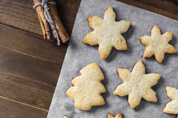 Christmas, New Year, DIY.Freshly baked homemade gingerbread cookies. Holidays preparation and creativity concept. Getting ready to celebration. 