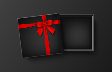 Opened black empty gift box with red bow and ribbon, vector illustration