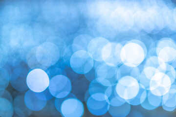 Background texture glitter. Abstract Blue Festive lights. Blur Bokeh glamor.