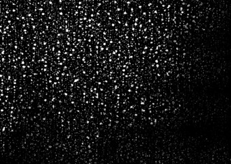 Small uneven spots and particles of debris. Abstract vector texture. Distressed uneven background. Grunge texture overlay with fine grains isolated on white background. Vector illustration. EPS10.