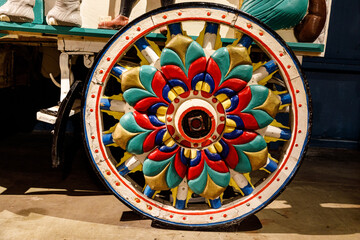 Old multicolored Wheel from a old vintage circus wagon