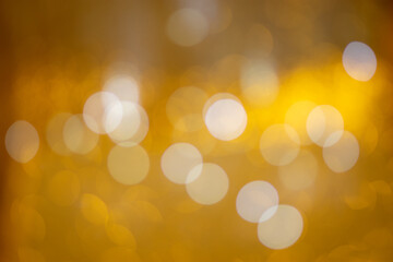 Golden bokeh, blurred background, christmas background.