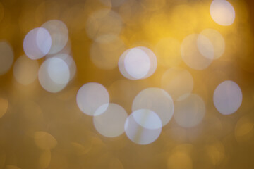 Golden bokeh, blurred background, christmas background.