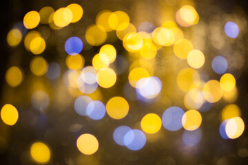 Golden bokeh, blurred background, christmas background.