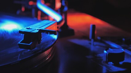 Vinyl record is spinning. Old retro turntable.Turntable stylus on a record