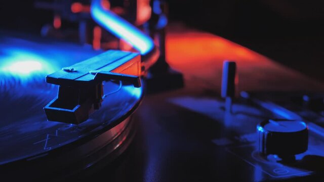 Vinyl record is spinning. Old retro turntable.Turntable stylus on a record