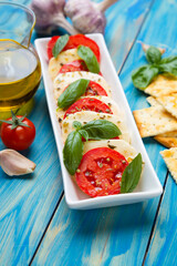 Italian caprese salad with mozzarella cheese