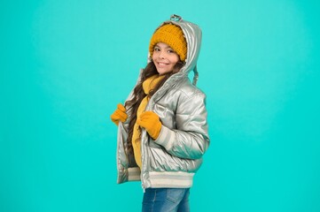 Real feeling. enjoy weather on christmas holidays. smiling stylish child. autumn season fashion....